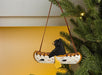 Abbott Carved Ornament Bear In Canoe - Bear Country Kitchen